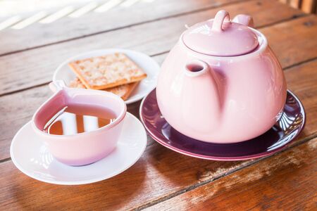 Hot cup of tea with teapot, stock photoの写真素材