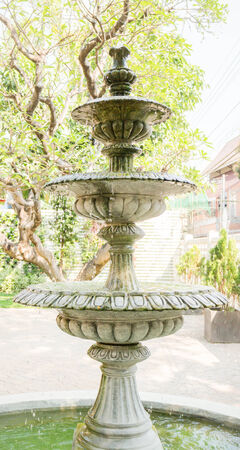 Vintage fountain in the gardenの写真素材