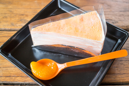 Whipped cream crepe cake with fresh orange, stock photoの写真素材