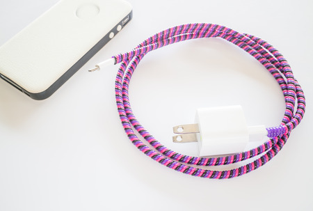 Smart phone charger isolated on white background, stock photo