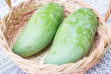 Fresh raw green sweet mango, stock photoの写真素材