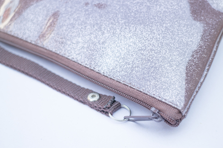 Simply brown zip hand bag, stock photoの写真素材