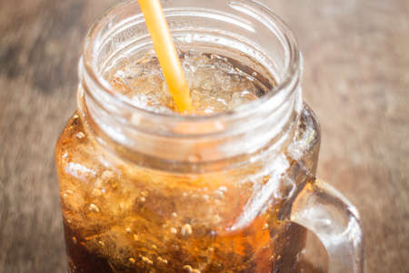 Refreshing brown soda with ice, stock photoの写真素材