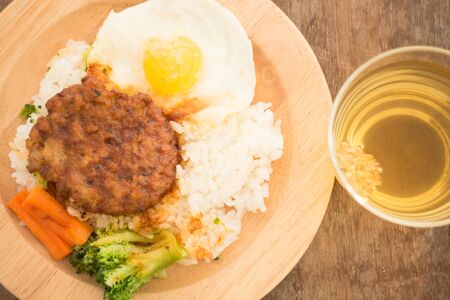 Rice with hamburg steak and fried egg, stock photoの写真素材