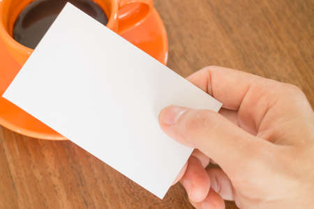 Hand holding a business card, stock photoの写真素材