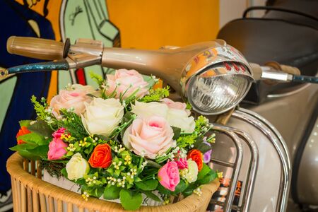 Decoration artificial flower in basket on motorbikeの写真素材