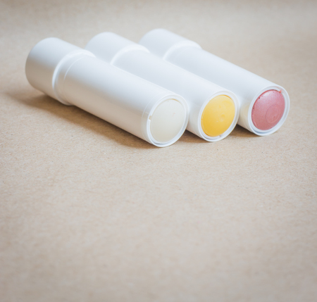 Moisturizer lipstick on brown natural background, stock photoの写真素材