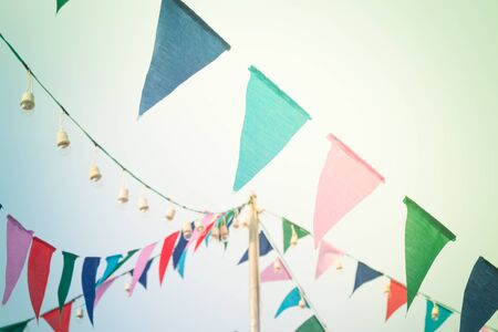 Party flags on the sky with vintage filter, stock photoの写真素材