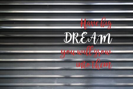 Dark metalic wall texture with inspiration quote, stock photo