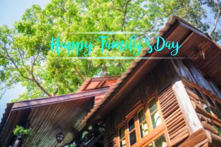 Happy family day message on wooden tree house background, stock photoの写真素材