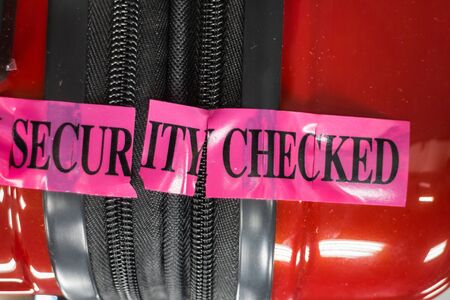 Security checked sticker on luggage, stock photoの写真素材
