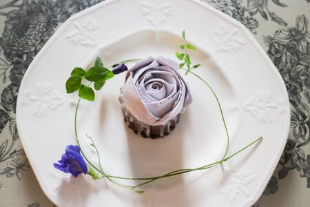 Romantic violet rose homemade cup cake, stock photoの写真素材