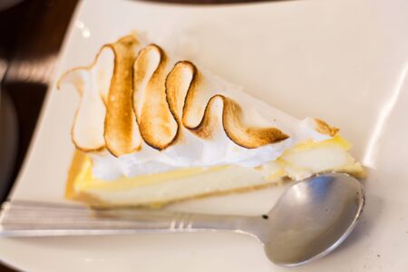 Piece of lemon cream cheese cake, stock photo