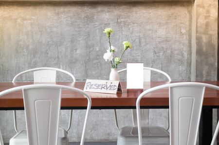 Mock up frame on table in bar restaurant cafe, stock photoの写真素材
