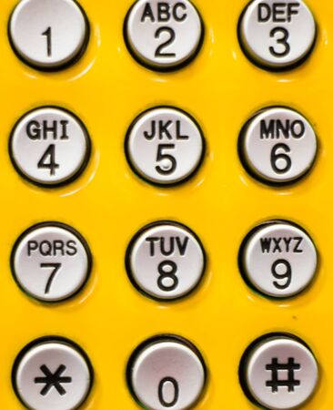 Public telephone button up close, stock photoの写真素材