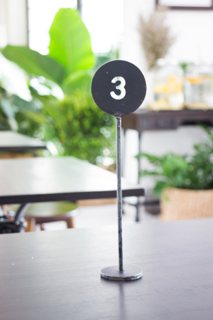 Metal reception table number 3, stock photoの写真素材