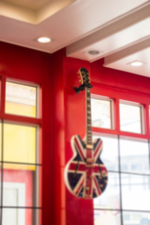 Blurred building with red windowの写真素材