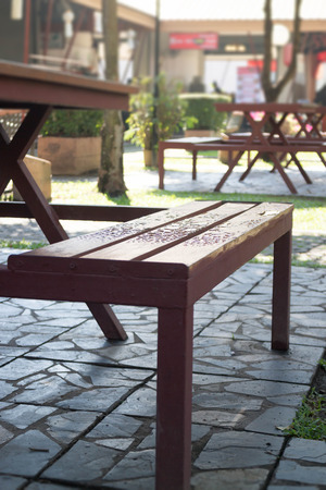 Waterdrops on bench in summer, stock photo