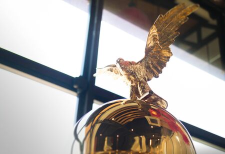 Blurred statue of a golden eagle, stock photoの写真素材