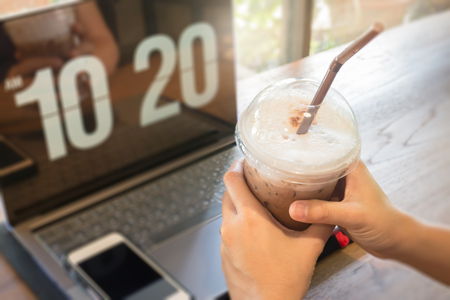 Woman using laptop in the coffee shop, stock photoの写真素材
