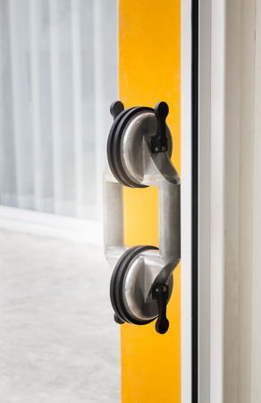 Glass sucker applied for door handle, stock photoの写真素材