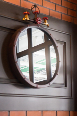 Vintage mirror decorated on old style wall, stock photoの写真素材