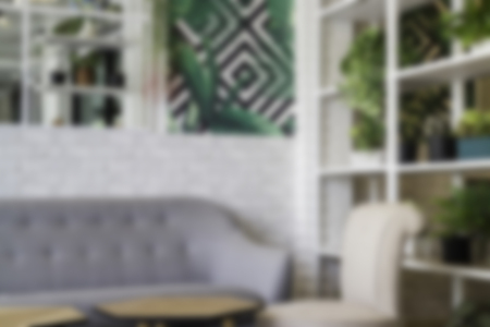 Blurred room ambiance with sofa and plant pot, stock photoの写真素材