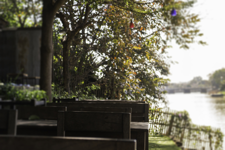 Outdoor garden with wooden set of furniture, stock photoの写真素材