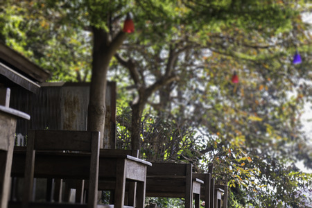 Outdoor garden with wooden set of furniture, stock photoの写真素材