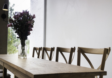 Wooden dining table in coffee shop, tock photoの写真素材