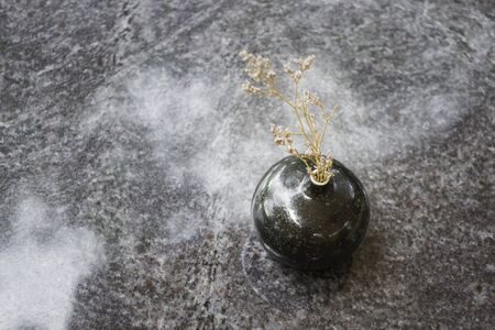 Mini vase on marble table, stock photoの写真素材