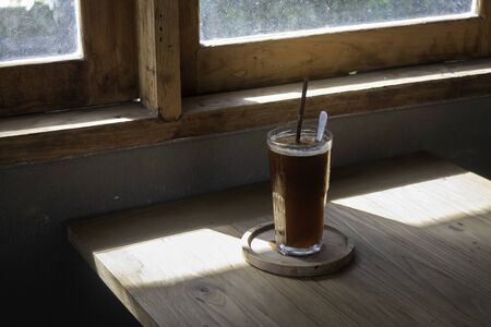 Signature drink of iced peach black coffee, stock photo
