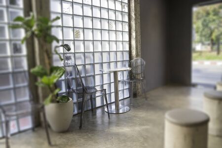 Minimal cafe interior decorating with modern furniture set, stock photo