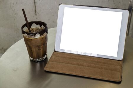Mobile working in coffee shop with table, stock photoの写真素材