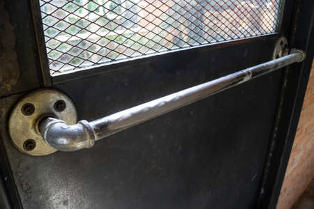 Shop interior metal door handle, stock photoの写真素材