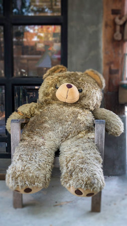 Cute teddy bear on the chair, stock photo