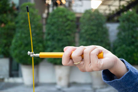 Hand of woman holding a speed jump rope, stock photo