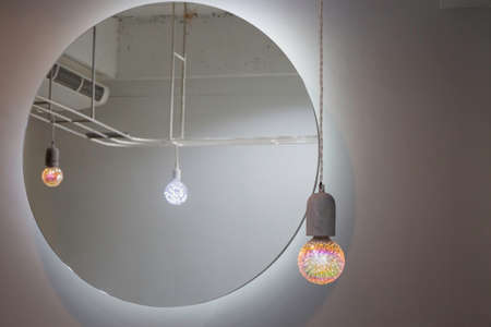 Modern electricity light bulb decorated in living room, stock photo