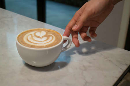 A cup of latte on the table, stock photoの写真素材