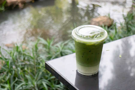 Glass of iced green tea milk drink, stock photoの写真素材