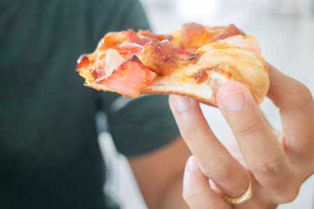 Pizza fast food in the office, stock photo