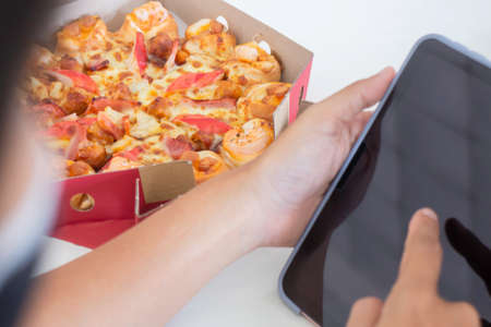 Pizza fast food in the office, stock photo