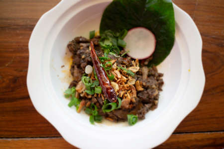 Thai spicy minced pork salad, stock photo
