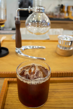 Syphon coffee maker in craft cafe, stock photo