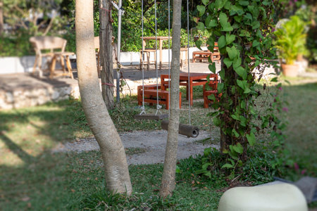 Outdoor playground with green grass ground, stock photoの写真素材