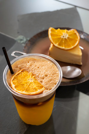 Piece of homemade cheesecake and a cup of coffee, stock photoの写真素材