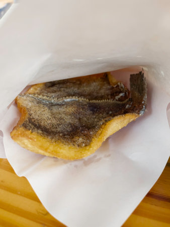 Crispy fried gourami fish Thai street food, stock photo