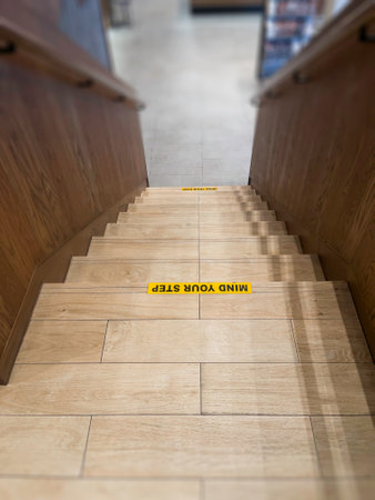 Modern stair case design in coffee shop interior, stock photo