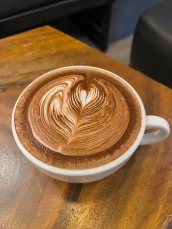 Hot latte coffee with heart in coffee cup, stock photoの写真素材