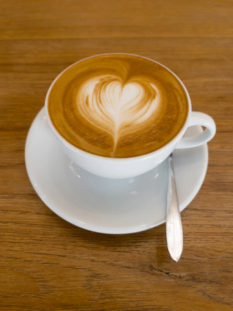 White cup of hot coffee latte, stock photoの写真素材